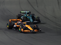 Oscar Piastri of McLaren and Fernando Alonso of Aston Martin Aramco during the Formula 1 Saudi Arabian Grand Prix at Jeddah Corniche Circuit...