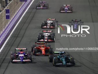 Lance Stroll of Aston Martin Aramco, Yuki Tsunoda of RB, Oliver Bearman of Ferrari and Kevin Magnussen of Haas during the Formula 1 Saudi Ar...