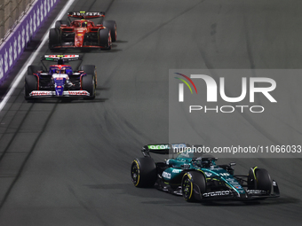 Lance Stroll of Aston Martin Aramco, Yuki Tsunoda of RB and Oliver Bearman of Ferrari during the Formula 1 Saudi Arabian Grand Prix at Jedda...