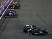 Lance Stroll of Aston Martin Aramco, Yuki Tsunoda of RB and Oliver Bearman of Ferrari during the Formula 1 Saudi Arabian Grand Prix at Jedda...