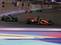 Oscar Piastri of McLaren and Fernando Alonso of Aston Martin Aramco during the Formula 1 Saudi Arabian Grand Prix at Jeddah Corniche Circuit...