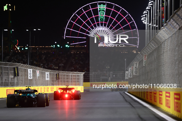 Oscar Piastri of McLaren and Lance Stroll of Aston Martin Aramco during the Formula 1 Saudi Arabian Grand Prix at Jeddah Corniche Circuit in...