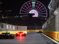 Oscar Piastri of McLaren and Lance Stroll of Aston Martin Aramco during the Formula 1 Saudi Arabian Grand Prix at Jeddah Corniche Circuit in...