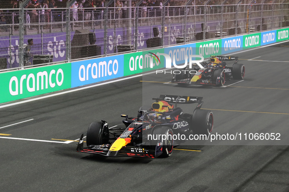 Max Verstappen and Sergio Perez of Red Bull Racing after the Formula 1 Saudi Arabian Grand Prix at Jeddah Corniche Circuit in Jeddah, Saudi...