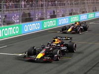 Max Verstappen and Sergio Perez of Red Bull Racing after the Formula 1 Saudi Arabian Grand Prix at Jeddah Corniche Circuit in Jeddah, Saudi...