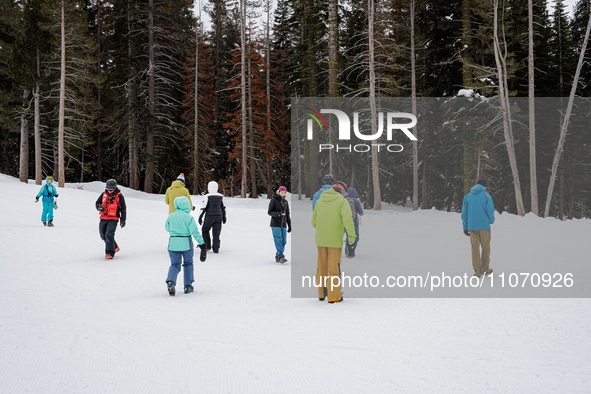 Andy Anderson, an Avalanche Forecaster with the Sierra Avalanche Center, is leading an avalanche transceiver workshop at Sugar Bowl Resort i...