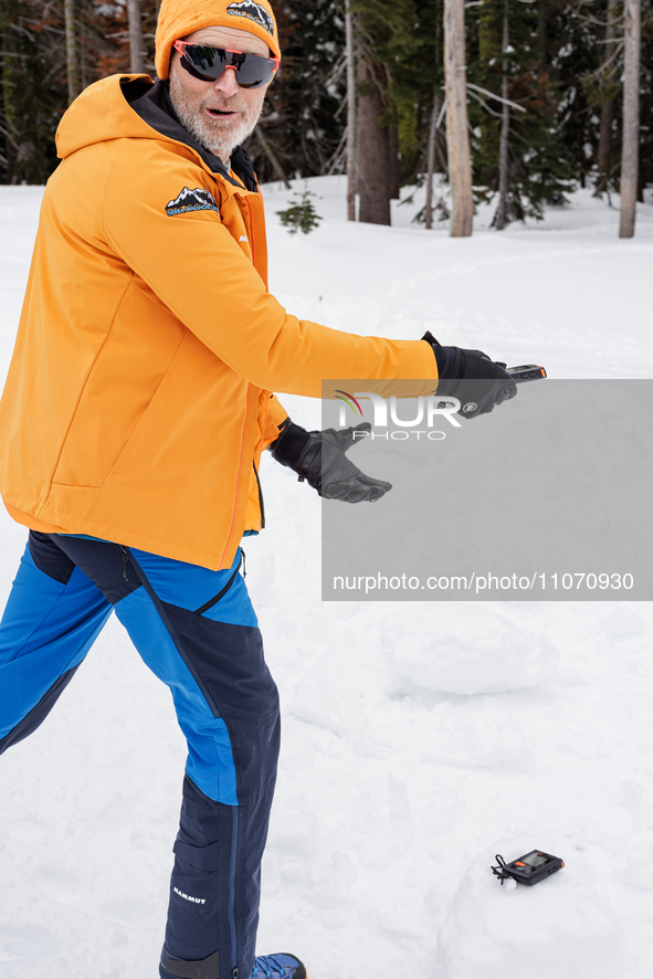 Andy Anderson, an Avalanche Forecaster with the Sierra Avalanche Center, is leading an avalanche transceiver workshop at Sugar Bowl Resort i...