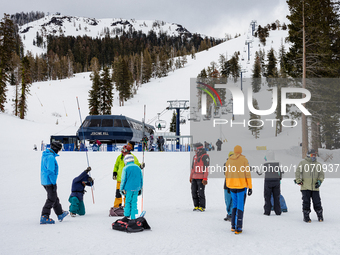 Andy Anderson, an Avalanche Forecaster with the Sierra Avalanche Center, is leading an avalanche transceiver workshop at Sugar Bowl Resort i...