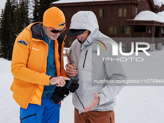 Andy Anderson, an Avalanche Forecaster with the Sierra Avalanche Center, is leading an avalanche transceiver workshop at Sugar Bowl Resort i...