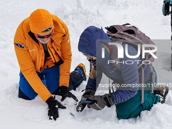 Andy Anderson, an Avalanche Forecaster with the Sierra Avalanche Center, is leading an avalanche transceiver workshop at Sugar Bowl Resort i...