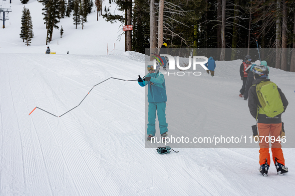 Andy Anderson, an Avalanche Forecaster with the Sierra Avalanche Center, is leading an avalanche transceiver workshop at Sugar Bowl Resort i...