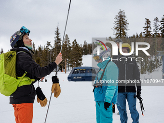 Andy Anderson, an Avalanche Forecaster with the Sierra Avalanche Center, is leading an avalanche transceiver workshop at Sugar Bowl Resort i...