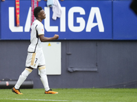 Vinicius Junior left winger of Real Madrid and Brazil celebrates after scoring his sides first goal during the LaLiga EA Sports match betwee...
