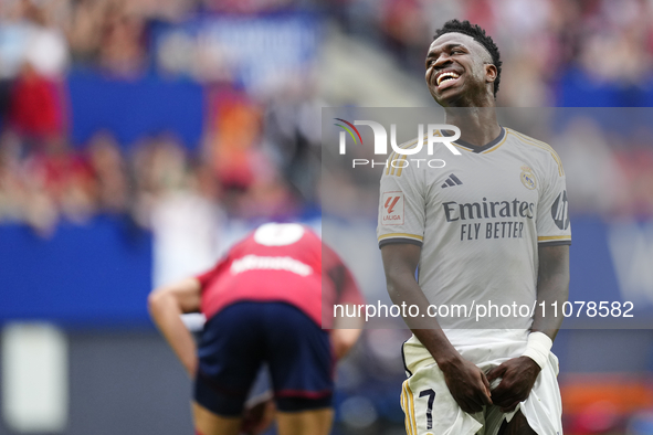 Vinicius Junior left winger of Real Madrid and Brazil lament a failed occasion during the LaLiga EA Sports match between CA Osasuna and Real...