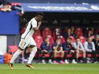 Vinicius Junior left winger of Real Madrid and Brazil celebrates after scoring his sides first goal during the LaLiga EA Sports match betwee...