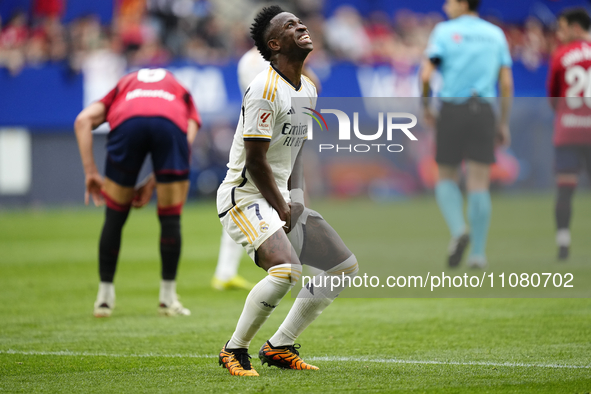 Vinicius Junior left winger of Real Madrid and Brazil lament a failed occasion during the LaLiga EA Sports match between CA Osasuna and Real...