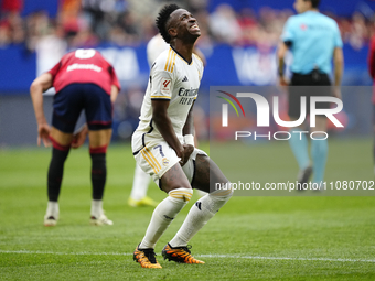 Vinicius Junior left winger of Real Madrid and Brazil lament a failed occasion during the LaLiga EA Sports match between CA Osasuna and Real...