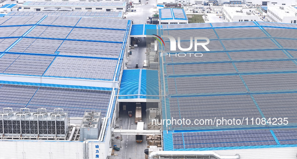 An aerial photo is being taken at the Tianhe solar energy base (Phase 1 and Phase 2) in Huai'an, China, on March 18, 2024. 