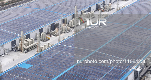 An aerial photo is being taken at the Tianhe solar energy base (Phase 1 and Phase 2) in Huai'an, China, on March 18, 2024. 