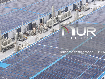 An aerial photo is being taken at the Tianhe solar energy base (Phase 1 and Phase 2) in Huai'an, China, on March 18, 2024. (