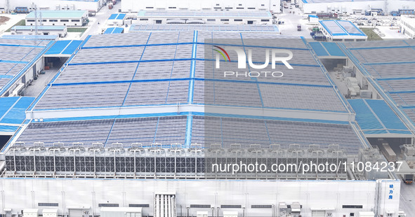 An aerial photo is being taken at the Tianhe solar energy base (Phase 1 and Phase 2) in Huai'an, China, on March 18, 2024. 