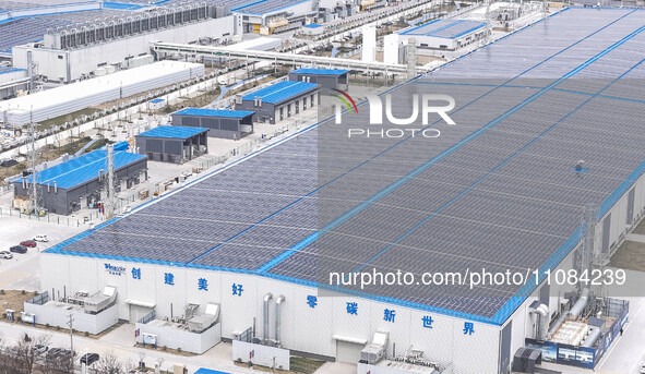 An aerial photo is being taken at the Tianhe solar energy base (Phase 1 and Phase 2) in Huai'an, China, on March 18, 2024. 