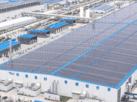 An aerial photo is being taken at the Tianhe solar energy base (Phase 1 and Phase 2) in Huai'an, China, on March 18, 2024. (