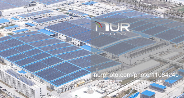 An aerial photo is being taken at the Tianhe solar energy base (Phase 1 and Phase 2) in Huai'an, China, on March 18, 2024. 