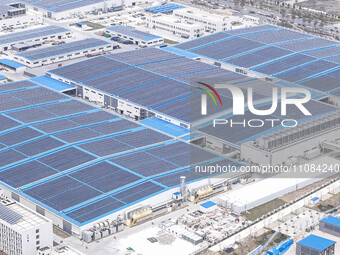 An aerial photo is being taken at the Tianhe solar energy base (Phase 1 and Phase 2) in Huai'an, China, on March 18, 2024. (