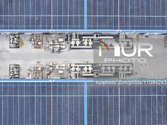 An aerial photo is being taken at the Tianhe solar energy base (Phase 1 and Phase 2) in Huai'an, China, on March 18, 2024. (