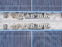 An aerial photo is being taken at the Tianhe solar energy base (Phase 1 and Phase 2) in Huai'an, China, on March 18, 2024. (