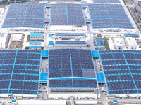 An aerial photo is being taken at the Tianhe solar energy base (Phase 1 and Phase 2) in Huai'an, China, on March 18, 2024. (