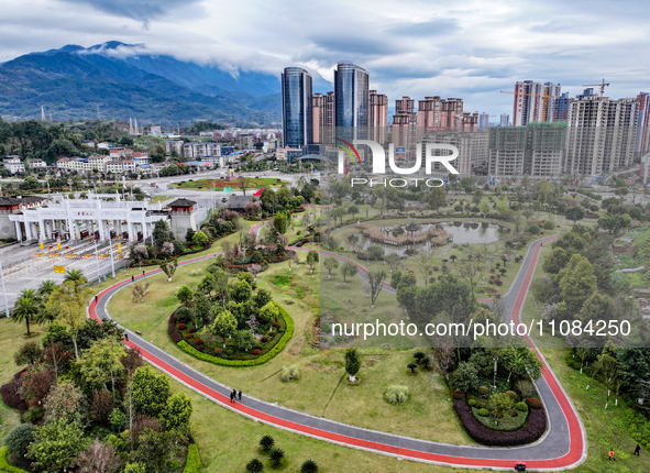 An aerial photo is showing a pocket park near a highway toll station in Guang'an, China, on March 18, 2024. 