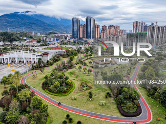 An aerial photo is showing a pocket park near a highway toll station in Guang'an, China, on March 18, 2024. (