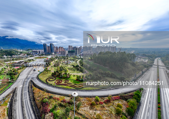 An aerial photo is showing a pocket park near a highway toll station in Guang'an, China, on March 18, 2024. 