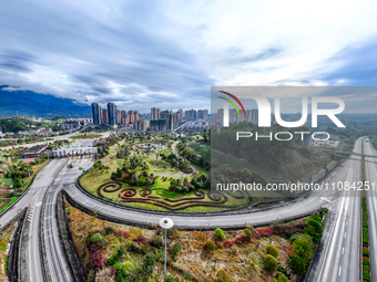 An aerial photo is showing a pocket park near a highway toll station in Guang'an, China, on March 18, 2024. (