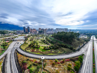 An aerial photo is showing a pocket park near a highway toll station in Guang'an, China, on March 18, 2024. (