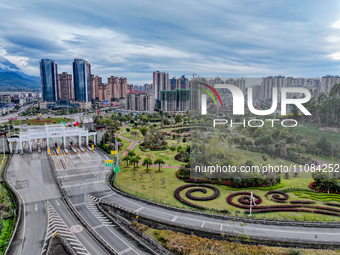 An aerial photo is showing a pocket park near a highway toll station in Guang'an, China, on March 18, 2024. (