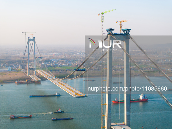 The Longtan Yangtze River Bridge is under construction in Nanjing, Jiangsu Province, China, on March 19, 2024. 