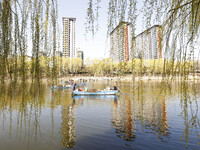 Cleaners are cleaning garbage on the Bian River to mark the upcoming World Water Day in Suqian, Jiangsu Province, China, on March 20, 2024....