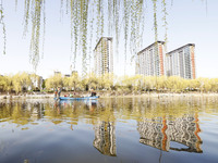 Cleaners are cleaning garbage on the Bian River to mark the upcoming World Water Day in Suqian, Jiangsu Province, China, on March 20, 2024....