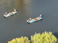 Cleaners are cleaning garbage on the Bian River to mark the upcoming World Water Day in Suqian, Jiangsu Province, China, on March 20, 2024....