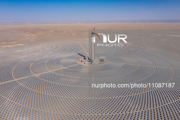 In Jiuquan, China, on March 18, 2024, an aerial photo shows the Jinta Zhongguang Solar 100,000kw solar thermal + 600,000kW photovoltaic proj...