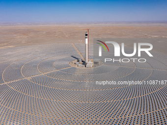 In Jiuquan, China, on March 18, 2024, an aerial photo shows the Jinta Zhongguang Solar 100,000kw solar thermal + 600,000kW photovoltaic proj...