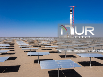 In Jiuquan, China, on March 18, 2024, an aerial photo shows the Jinta Zhongguang Solar 100,000kw solar thermal + 600,000kW photovoltaic proj...