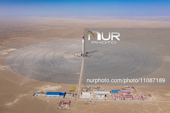 In Jiuquan, China, on March 18, 2024, an aerial photo shows the Jinta Zhongguang Solar 100,000kw solar thermal + 600,000kW photovoltaic proj...