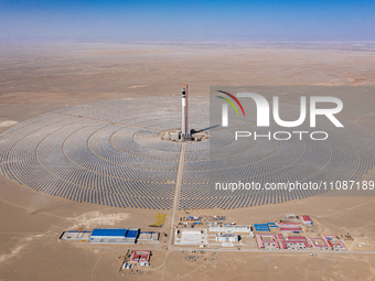 In Jiuquan, China, on March 18, 2024, an aerial photo shows the Jinta Zhongguang Solar 100,000kw solar thermal + 600,000kW photovoltaic proj...