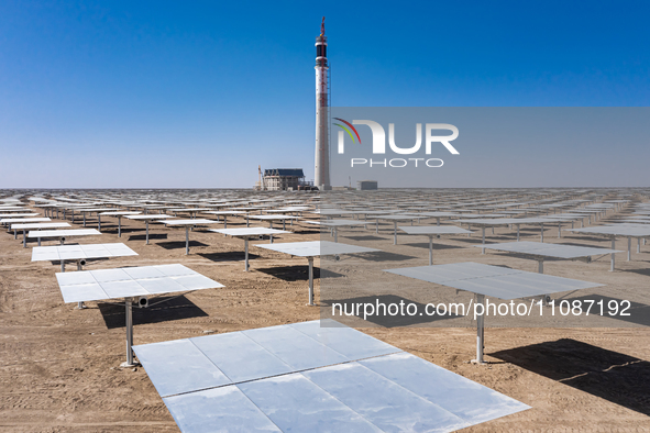 In Jiuquan, China, on March 18, 2024, an aerial photo shows the Jinta Zhongguang Solar 100,000kw solar thermal + 600,000kW photovoltaic proj...