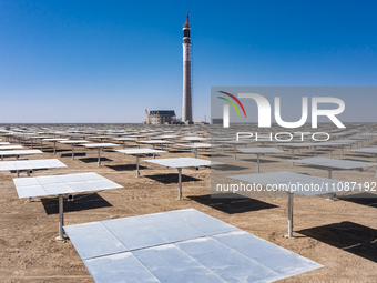 In Jiuquan, China, on March 18, 2024, an aerial photo shows the Jinta Zhongguang Solar 100,000kw solar thermal + 600,000kW photovoltaic proj...