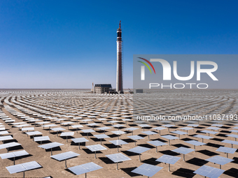 In Jiuquan, China, on March 18, 2024, an aerial photo shows the Jinta Zhongguang Solar 100,000kw solar thermal + 600,000kW photovoltaic proj...